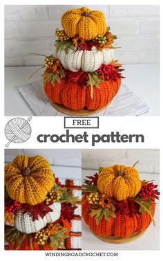 crocheted pumpkins are stacked on top of each other with leaves and berries