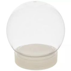 a clear glass ball with a white base on a white background, it looks like an object