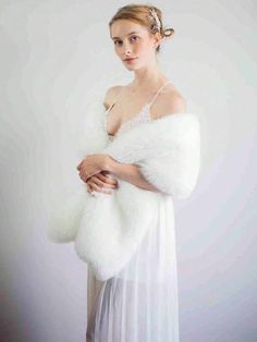 Details:Raw Hem \nColor:Beige \nElement:Other \nMaterial:Fabric \nComposition:100% Polyamide \nCare Instructions:Hand wash or professional dry clean \n White Faux Fur Scarf, Fluffy White Scarf, Fur Scarf Outfit, White Fur Shawl, Scarf Aesthetic, Fluffy Scarf, Wedding Jackets, Faux Fur Scarf, Faux Fur Scarves