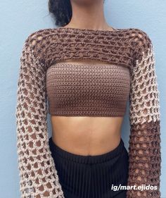 a close up of a person wearing a crop top