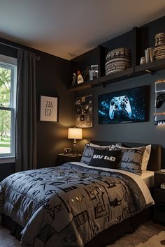 a bedroom with black walls and gray bedding