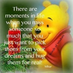 winnie the pooh with a candle and christmas tree in front of it, saying that there are moments in life when you miss someone so much