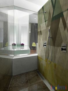 a bathroom with a shower, sink and mirror on the wall next to each other