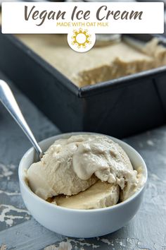 a bowl filled with ice cream sitting on top of a table