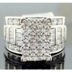 a white gold ring set with two rows of diamonds