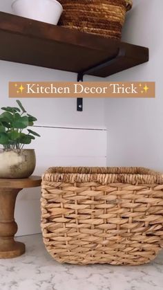 a basket sitting on top of a counter next to a wooden shelf