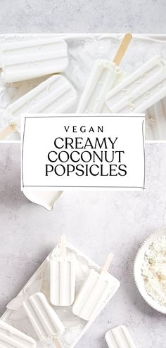 vegan creamy coconut popsicles on a white tray with text overlay that reads, vegan creamy coconut popsicles