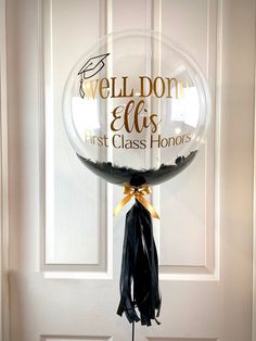 a clear balloon with the words, weldon't eefs first class honorarys on it