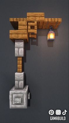 a lamp that is on the side of a wall next to some rocks and bricks