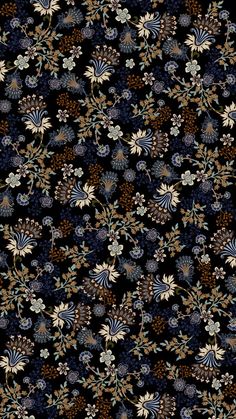 a black background with many different flowers and leaves