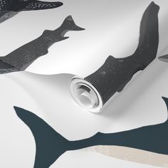 an abstract wallpaper with black and white designs on it's surface, including shark silhouettes