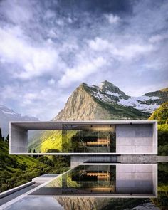 an artistic rendering of a house with mountains in the background and water reflecting on the ground