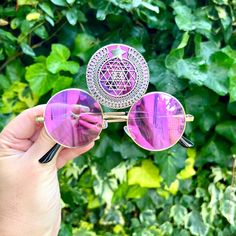 💓Third eye statement sunglasses by Alexis Exclusive  💓This quirky pair of Third Eye Sunglasses are the perfect unusual accessory if you love something different. 💓The three lenses are gold metal and they have mirrored pink lenses. In the centre lens they have a large metal silver Sri Yantra meditation embellishment. 💓Great for festivals, carnivals, holidays, or everyday wear if that's your thing 😉 💓UV protection. 💓Exclusive design made by myself, you won't see any others like these anywhe Third Eye Sunglasses, Statement Sunglasses, Pink Lenses, Black Pouch, Sri Yantra, Third Eye, Eyewear Sunglasses, Uk Shop, Exclusive Designs