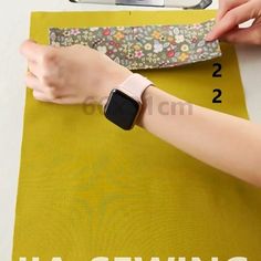 a woman is working on an apple watch with the instructions for how to use it