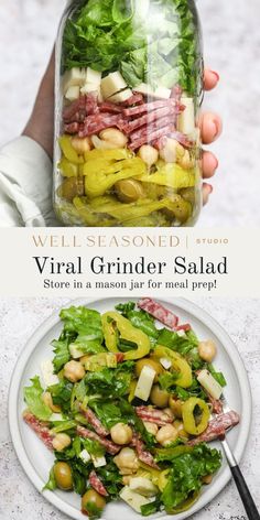 a person holding a mason jar filled with vegetables and meats on top of a white plate