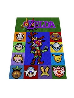 the legend of zelda quilt is on display in front of some grass and flowers