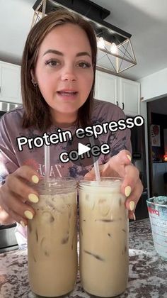 a woman is holding two drinks in front of her face and the caption reads protein espresso coffee