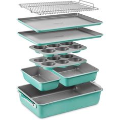 three pans stacked on top of each other with trays in the middle and an oven rack above them