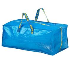 a large blue bag sitting on top of a white floor