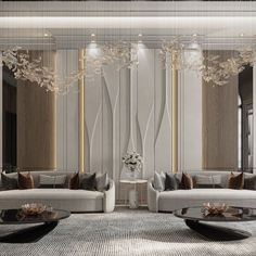 a living room with couches, tables and chandeliers