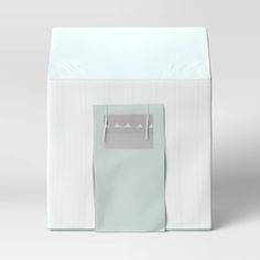 an empty white box with a paper bag on it's front and bottom side