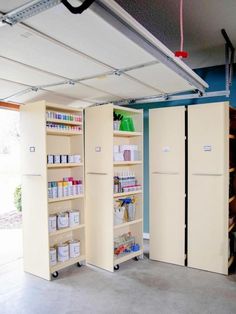 an empty storage room with two doors open