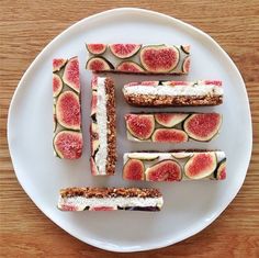 a white plate topped with slices of fruit