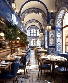 the interior of a restaurant with blue and white decor