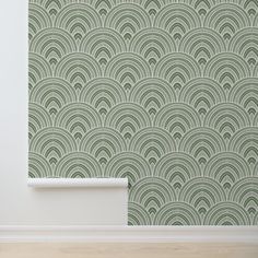 an art deco wallpaper design with green and white wavy waves on the back ground