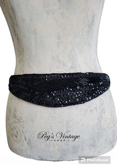 "Vintage Black Sequin & Glass Beaded Belt Twilight Collection Vintage black satin sequin glass beaded belt. Sequin/beads on satin with elastic stretch strings. Excellent condition.  C Hook Latch  Measures approx. 30\"Long - Best Fit 28\" - 32\" Waist , Center width 2 1/2\"  1980s vintage hand made fashion  Vintage sizes vary from today sizing. It is best to check the measurements carefully with those of a similar item of your clothing for the most accurate idea of fit FREE US Shipping $35 and ov Twilight Collection, Beaded Belt, Pink Beads, Sequin Beading, Suspender Belt, Rhinestone Bracelet, Support Handmade, 1980s Vintage, Fashion Vintage