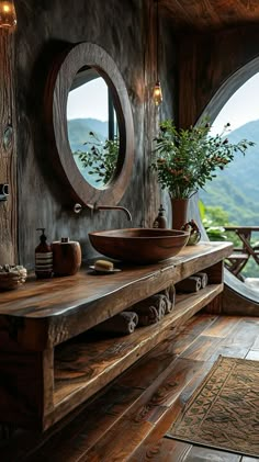 a wooden table with a bowl sink and mirror on it in front of a window