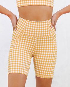 Upgrade your activewear in the Gingham Gal Biker Shorts in marigold that feature a high rise. Fitted 73% Recycled Polyester and 2% Spandex Hand Wash Cold, Dry Flat Designed in Australia High Rise Side Pockets Ribbed Fabrication Four-way Stretch No Closures Not Lined Styled with: Gingham Bra, Cruising Around Top, and Common Sneaker. Cute Skirt Outfits, Quilted Crossbody Bag, Half Skirt, Cute Preppy Outfits, Cute Skirts, New Arrival Dress, Biker Shorts, Bike Shorts, Relaxed Style