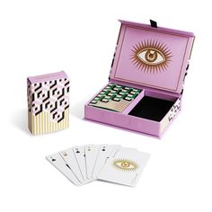 an open box with playing cards inside it