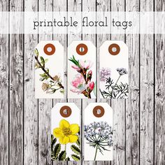 four tags with different flowers on them