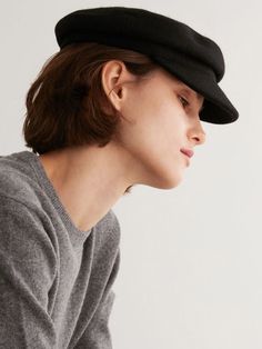 - Newsboy cap design- Adjustable velcro bandMeasurements- Brim: 1.9in- Height: 2.7in- Hat circumference: 21.6in-22.8inComposition - 100% WoolDesigner- Made in Korea- by NUHAT- Style# 300750936 Black Wool Beret Cap, Black Winter Visor Baseball Cap, Black Brimmed Visor, Winter Black Baseball Cap With Curved Brim, Curved Brim Winter Hat For Work, Black Wool Beret, Black Baseball Cap For Fall, Black Wool Cap Hat, Black Fall Hats For Workwear