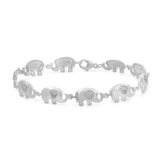 Take your look on a playful safari adventure with this cute diamond accent elephant link bracelet. Fashioned in sterling silver Elephant-shaped links shimmer with beaded heart-shaped ears. A trio of diamond accents adds sparkle to the design. This 7.5-inch bracelet secures with lobster claw clasp. Personalized Silver Diamond Bracelet, Animal Bracelet, Elephant Jewelry, Silver Link Bracelet, Elephant Bracelet, Safari Adventure, Silver Elephants, Sterling Silver Bracelet, 925 Sterling Silver Jewelry