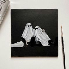 a painting of two white ghostes laying on the ground