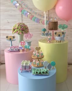 an image of a cake table with balloons