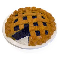 a pie sitting on top of a white plate