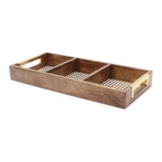 a wooden tray with four compartments and gold handles