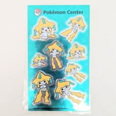 the pokemon center stickers are yellow and white