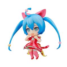 a doll with blue hair is flying through the air and wearing a red dress on top of her head