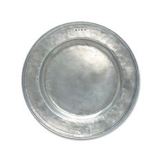 an empty silver plate on a white background