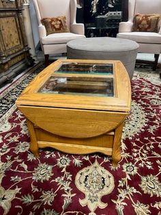 a living room with two chairs and a coffee table