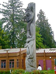 a large statue in front of a building