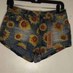 Rue 21 Sunflower Shorts Jeans Completely New With Tag Size: 5/6 About S Condition: New With Tags Summer Printed Cotton Shorts, Floral Print Short Bottoms For Spring, Fitted Floral Print Shorts, Printed Short Bottoms For Summer, Multicolor Floral Print Bottoms For Summer, Multicolor Floral Print Summer Bottoms, Summer Floral Print Multicolor Bottoms, Printed Shorts For Spring And Summer, Yellow Floral Print Vacation Bottoms