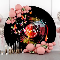 an artistic display with balloons and confetti