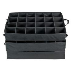 two black storage bins with dividers on each side, one holding compartments for various items