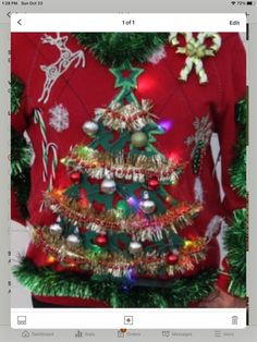 an ugly ugly christmas sweater with lights and ornaments on the tree is seen in this image