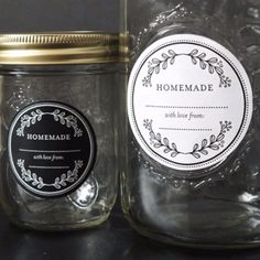 two mason jars with labels on them sitting next to each other, one has a label that says homemade